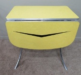 Yellow enamel top drop leaf and chrome drop leaf table