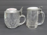 Two Porcelain top advertsing beer steins, German