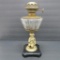 Metal, figural base oil lamp, 12