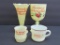 Four pieces of Michigan custard glass souvenirs