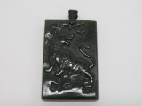 Carved Jade Tiger Pendant, 2 1/2