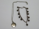 Indian head nickel style necklace and bauble bell bracelet