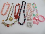 Assorted costume jewelry, colored beads, earrings and bracelets