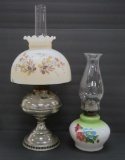 Two oil lamps, rayo nickel style and floral decorated