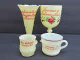 Four pieces of Michigan custard glass souvenirs