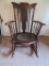 Lovely ornate press carved back rocker with leather seat and twisted spindles