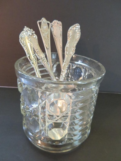 Five Sterling spoons