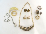 Assorted vintage jewelry, earrings, pins and necklaces