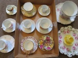 11 Cup and saucer sets and one tea cookie plate