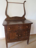Commode with towel bar