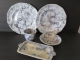 Black and white ironstone place setting and cobalt transferware tray