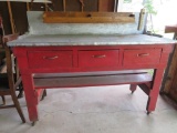 5' Metal top work bench, three drawer, on castors