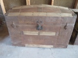 Distressed hump back trunk with insert