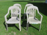 Four High Back plastic stacking chairs