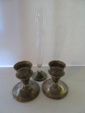 Three pieces of waited Sterling, candlesticks and bud vase