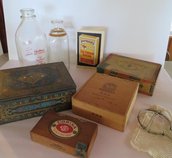 Vintage milk bottles, chocolate tin and wooden cigar boxes