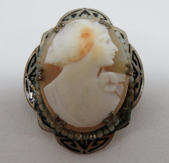 Carved cameo with bead surround
