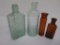 Four medicine bottles, Cholagogue, Balsam of Life and two druggist