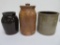 Three pieces of stoneware, crock and jars