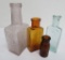 Three colored Chicago medicine bottles and Planter Rye Cincinnati Ohio