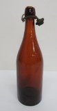 Amber CV #2 Milwaukee bottle, Chas Valley with stopper, 11 1/2