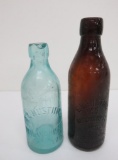 Two Husting bottles, Hutchinson style, amber and aqua