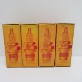 Four First American Antique Spark Plugs with boxes, glass