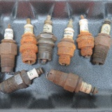 Eight Antique Spark Plugs, all different makers