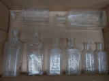 Eight clear Milwaukee Pharmacist Druggist Bottles, 3 1/2