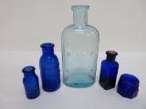 Cobalt and blue Bromo Seltzer, Milk of Magnesia and Medicine bottles