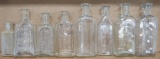 Eight Milwaukee Pharmacy Druggist Bottles, clear, 3 1/2
