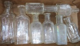 Eight Small Pharmacy and Chemical bottles, clear, 2 1/2