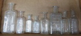 Eight Pharmacy and Druggist Bottles, clear, 2 3/4