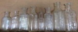 Eight Milwaukee Pharmacy and Druggist bottles, clear, 2 3/4