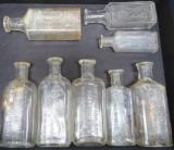 Eight Milwaukee Pharmacy and Druggist Bottles, clear, 3 1/2