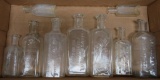 Nine Milwaukee Pharmacy and Druggist bottles, clear, 3