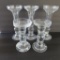 Five large glass candlesticks for pillar candles