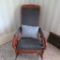 Carved and Upholstered Rocker with Pillow