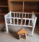 Wooden doll bed on wheels and push toy