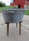 Galvanized wash tub on wooden stand