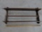 Wooden shelf and vintage Jefferson Funeral Home yard stick