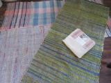 Three scatter rugs and non slip cushion