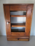 Primitive wooden medicine cabinet