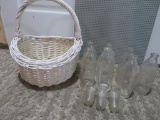 Pyrex baby bottles, measure cups and basket