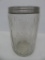 Hoosier Sellers cabinet style jar with woman and rolling pin embossed design, 7