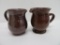 Two Redware cream pitchers, 4 1/2