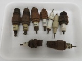 Nine vintage spark plugs