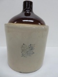 Western Stoneware two tone jug, some chips noted, one gallon, 10 1/2