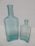 Two New York Medicine bottles, aqua, 5 1/4