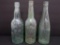 Three Pabst Beer bottles, three designs, 9